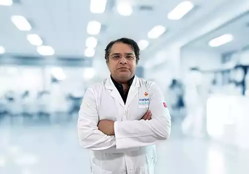 Dr. Kundan