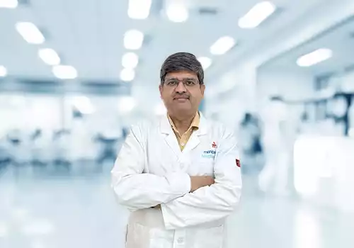 Dr. Parmod Mittal
